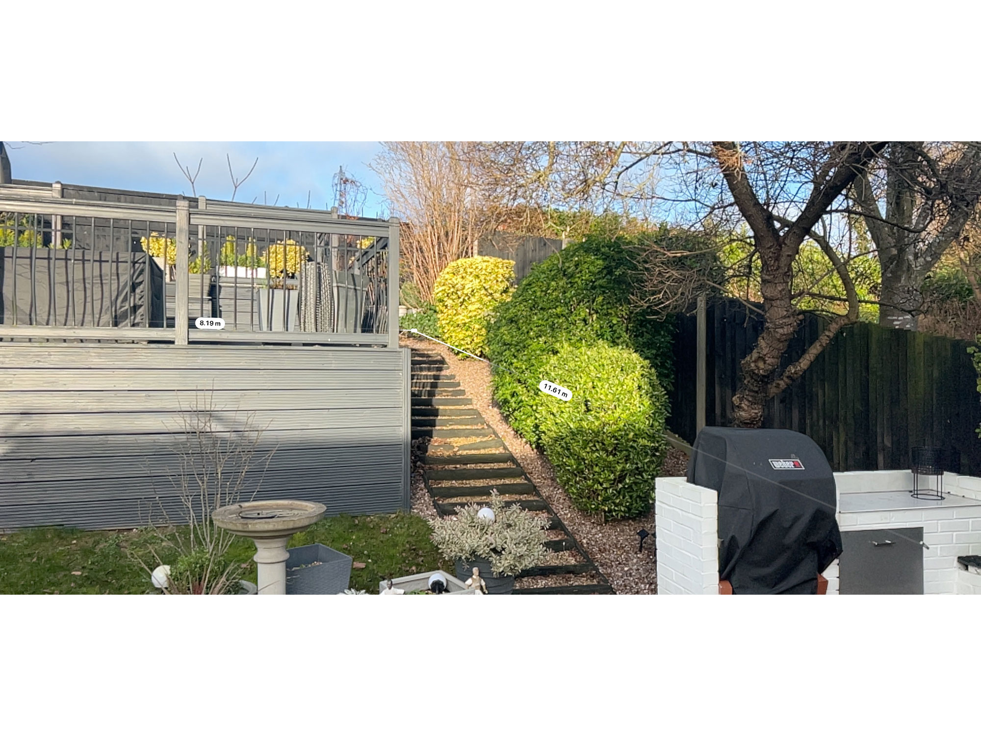 Modern porcelain tiles used to create a stylish contemporary garden patio